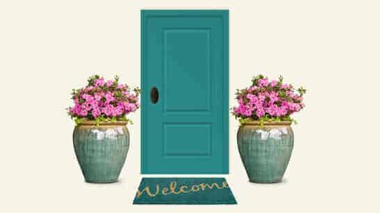 2 Planting Containers on each side a turquoise door and a welcome mat